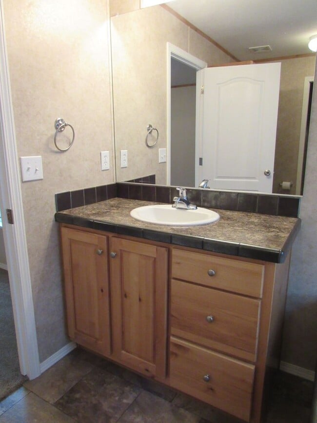 Building Photo - 3 Bed 2 bath Mills Mobile Home on Beautiful Treed Lot
