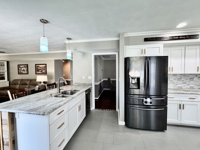Building Photo - Available 07-01-26! 2-Car Attached Garage - Pet Friendly w/Restrictions - Fenced Yard on a HUGE C...