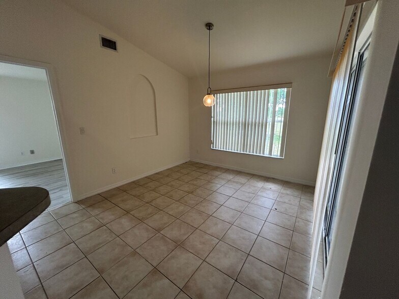 Building Photo - Nice 3/2 with newer carpet