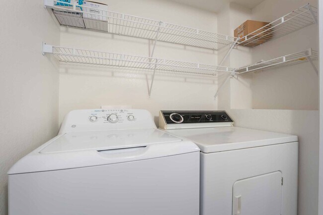 Building Photo - Charming First-Floor Home with Open Living and Private Patio