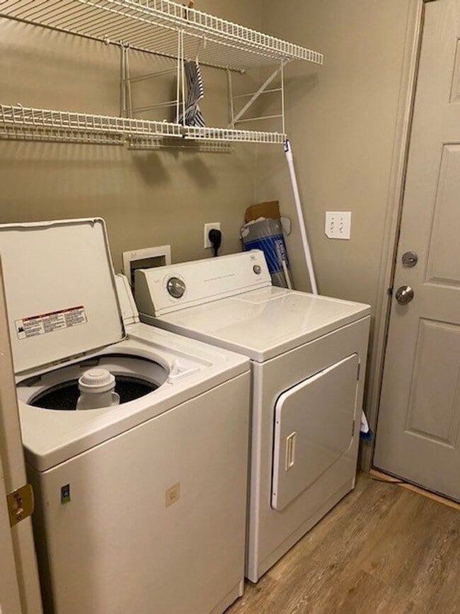 Building Photo - Introducing a charming 3-bedroom, 2-bathroom house located in the desirable Carolina Beach, NC.
