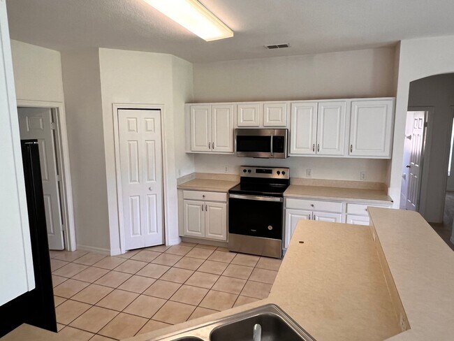 Building Photo - 4/2 in Bellalago with no rear neighbor