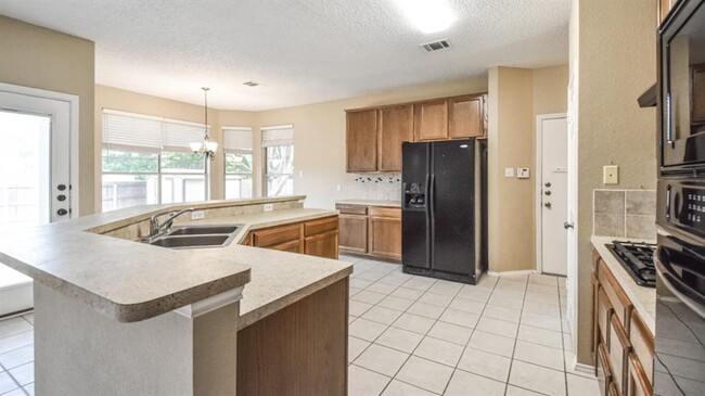 Building Photo - 1300 Crocus Cove