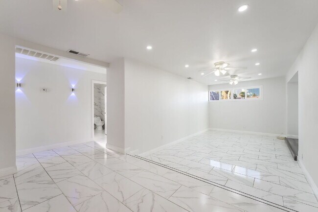 Building Photo - Single Story,  Totally Renovated , 3 bedroom, 2 bathroom Home with  extensive privacy and gated h...