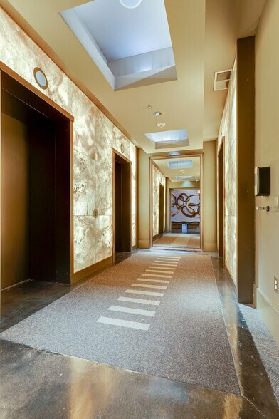 Corridor from elevators to condo unit - 600 12th Ave S