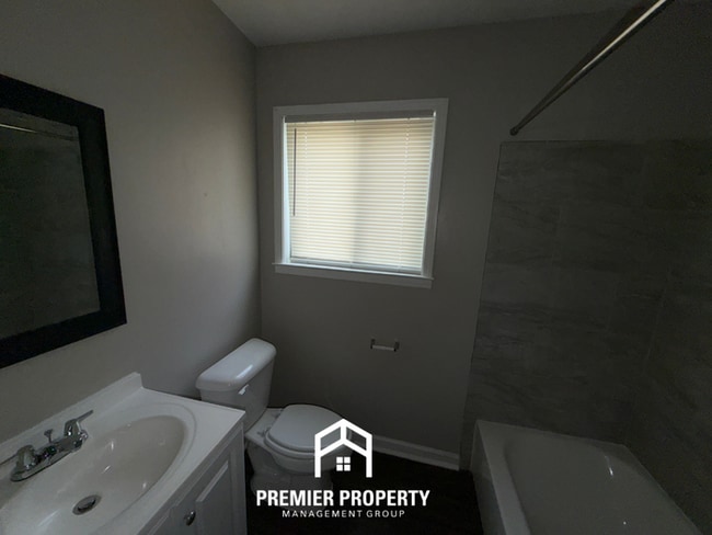 Building Photo - Spacious 4BR/2BA Home in Bartlett Cove | Brick Fireplace & Formal Dining