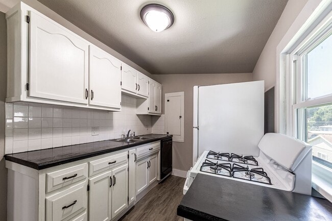 Building Photo - Remodeled 2-Bedroom Bungalow with Detached Garage & Large Backyard