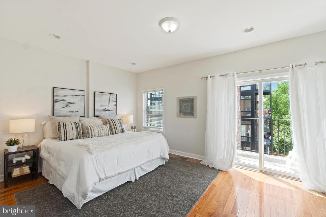 Master bedroom with view to balcony - 655 16th St NE