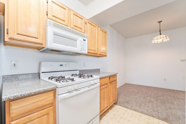 Building Photo - Spacious 3-Bedroom Condo with Garage and Two Private Patios!