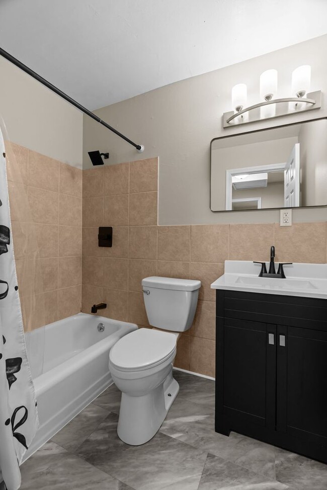 Building Photo - Stunning Brick Duplex with private partially finished basement in Kirkwood