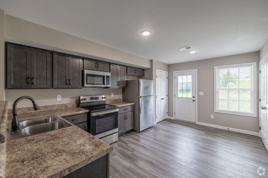 2BR, 2.5BA - 1,005SF - Kitchen - Chalet Village Townhomes