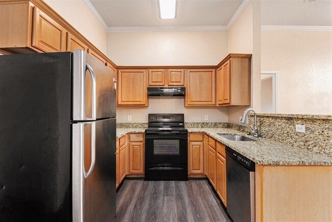 Building Photo - Discover your new home in this spacious 3-bedroom, 2-bath duplex located in the charming city of ...