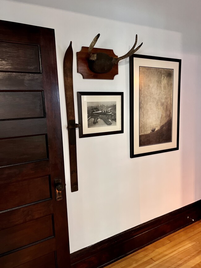 One of the artfully decorated hallways. - 2424 Stevens Ave