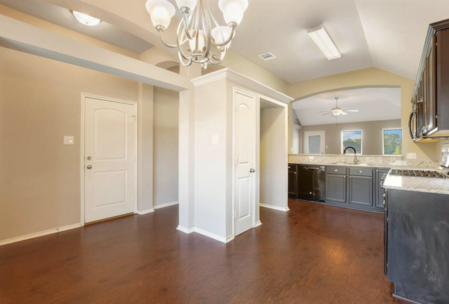 Looking into kitchen from dining - 100 Brookside Dr