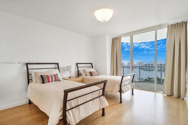 Building Photo - 18671 Collins Ave