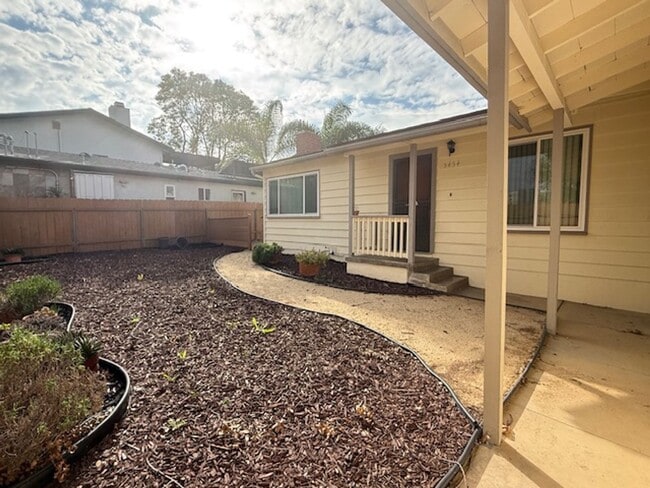 Building Photo - College View Estates Gem – Spacious 3BR Home with Private Yard & RV Parking