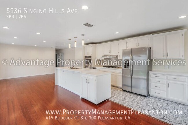 Building Photo - 5936 Singing Hills Ave
