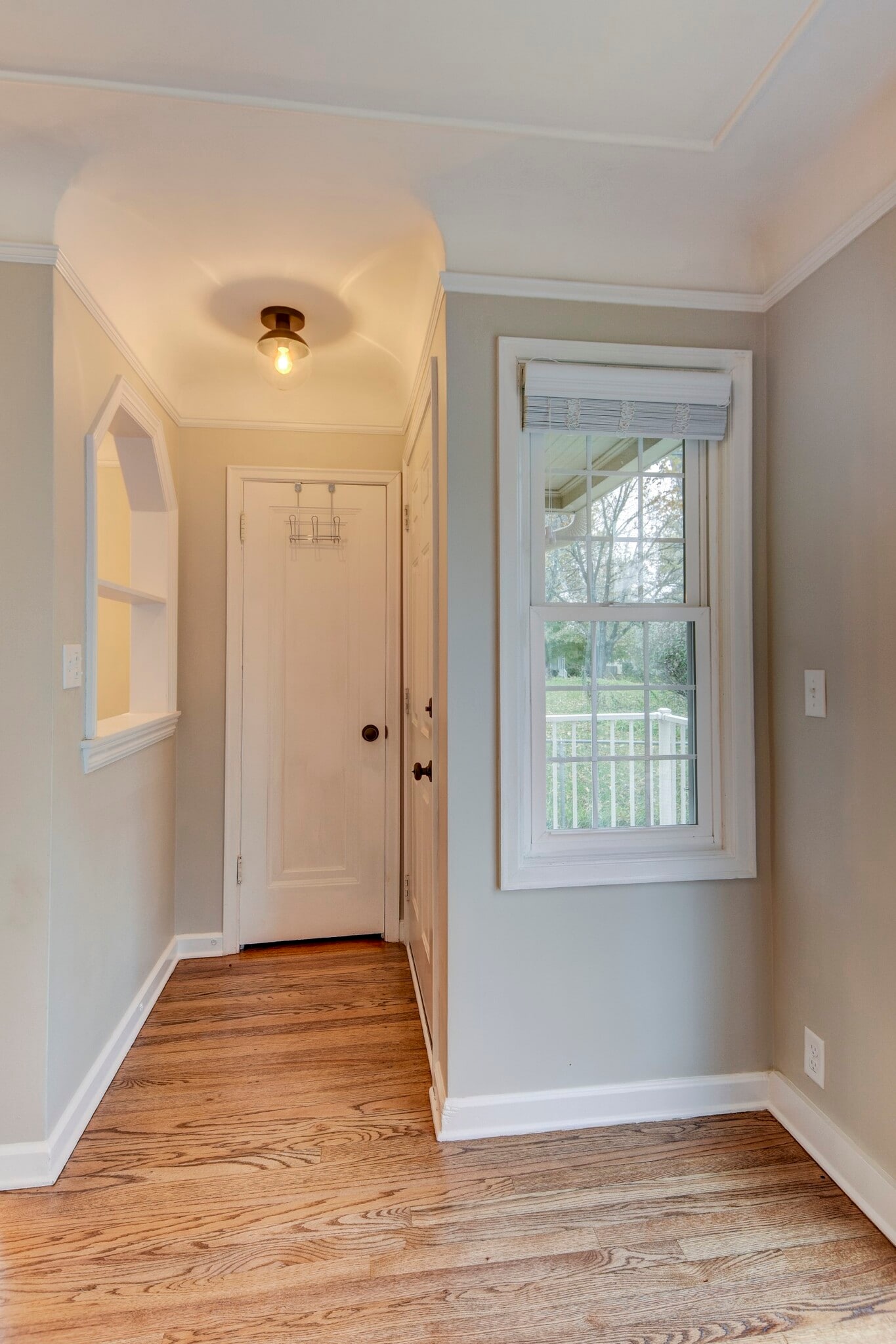 Agreeable Grey walls. New light fixture and blinds. - 5210 Rees St