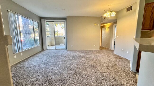 Building Photo - Modern 2 Bed Condo in Prime Southwest Vegas
