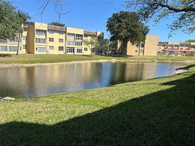 Building Photo - 6090 NW 64th Ave