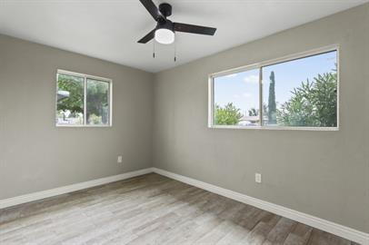 Building Photo - 3 bedrooms 1 bathroom with all tile flooring