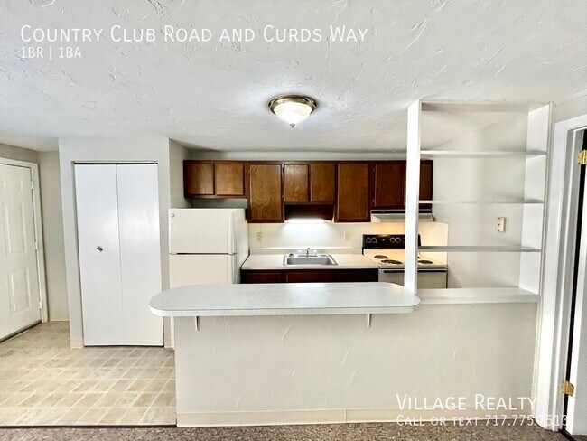 Building Photo - 613 Country Club Rd