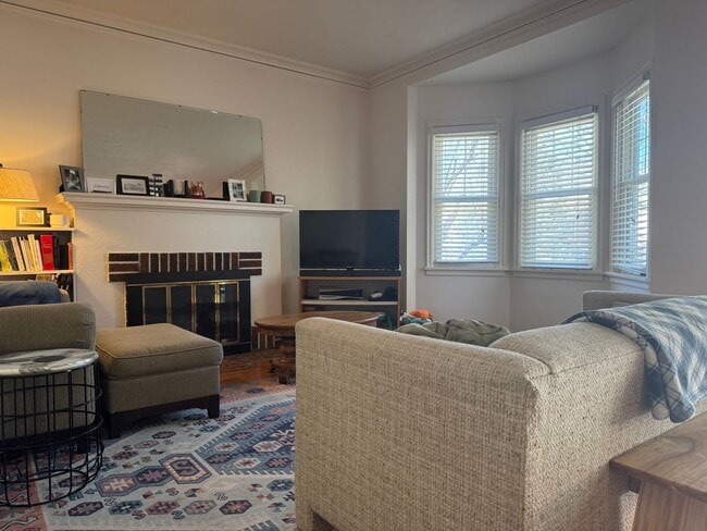 Building Photo - Charming Brick Ranch with Finished Basement & Fenced Yard