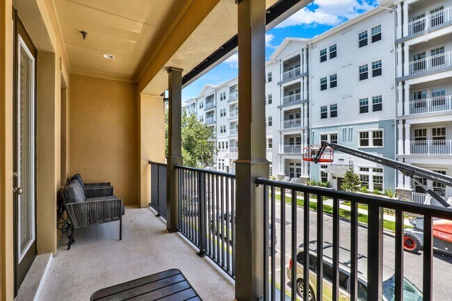Building Photo - Stunning 3/3.5 Baldwin Park Townhome with 2-Car Garage & Upgrades Galore!