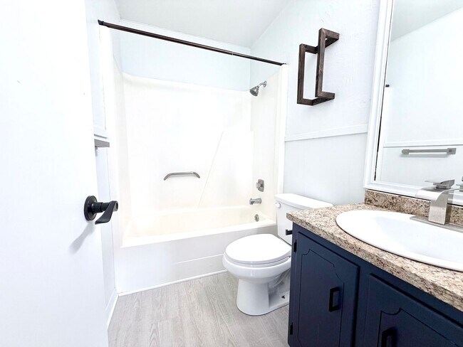 Building Photo - Stylish Two-Story Duplex with Loft, Fireplace & Private Backyard in New Braunfels!