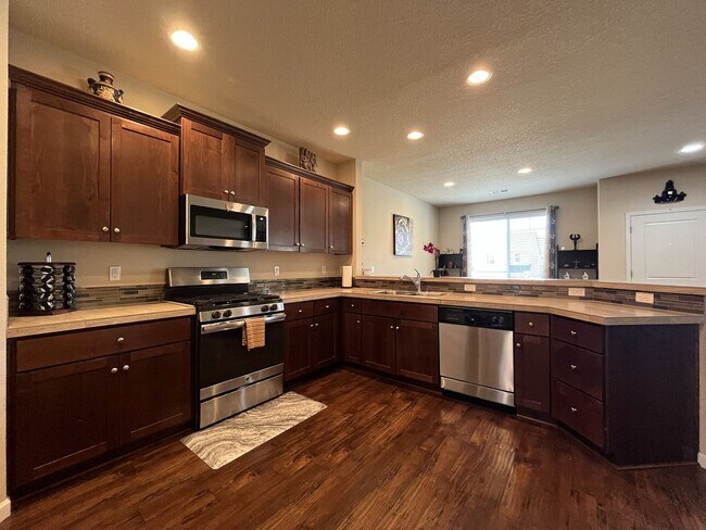 Building Photo - Stunning 4 Bedroom + Loft Bethany Home with Open Layout, Stainless Steel Kitchen, Two Car Garage ...