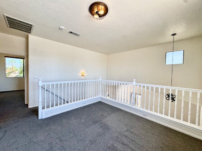 Building Photo - Spacious 4BD/3BA NLV Home with Downstairs ...