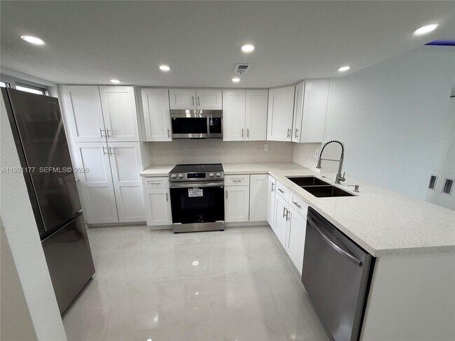 Building Photo - West Okeechobee Road, Hialeah, FL 33016 - 3 BR 2 BA condo