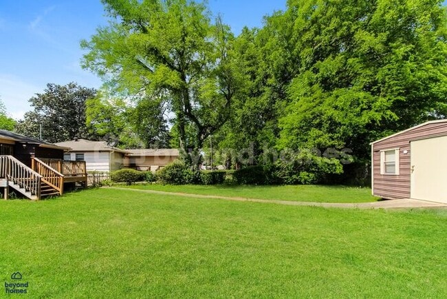 Building Photo - Updated Bungalow with Massive Deck and Fully Fenced Yard!