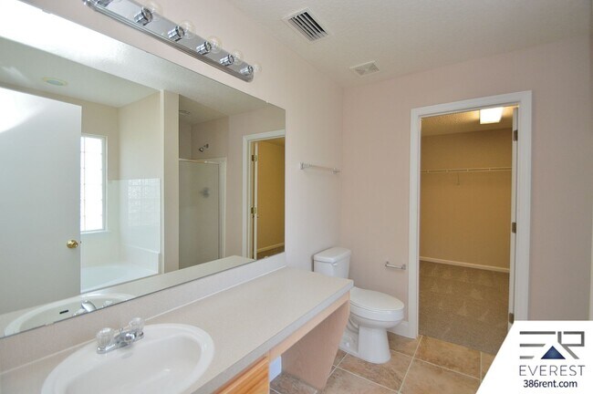 Building Photo - SPACIOUS, FULLY FENCED 4/2.5/2 IN DESIRABLE MATANZAS WOODS