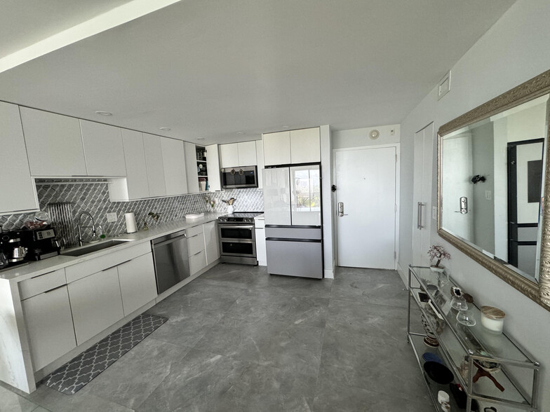 Open Modern Kitchen appliances with WiFi smart control - even viewing inside the refrigerator remote - 600 NE 36th St