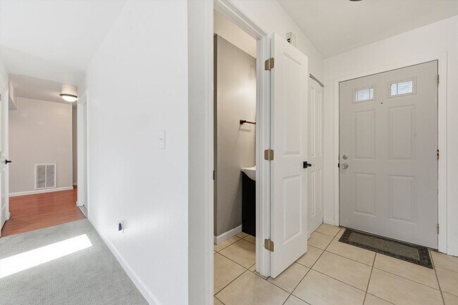 Building Photo - Spacious 4-Bedroom Townhome Backing to Open Space – Attached 2-Car Garage!