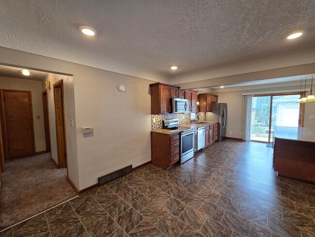 Building Photo - Well-Maintained 4BR Home – Garage + Washer/Dryer, dishwasher Included