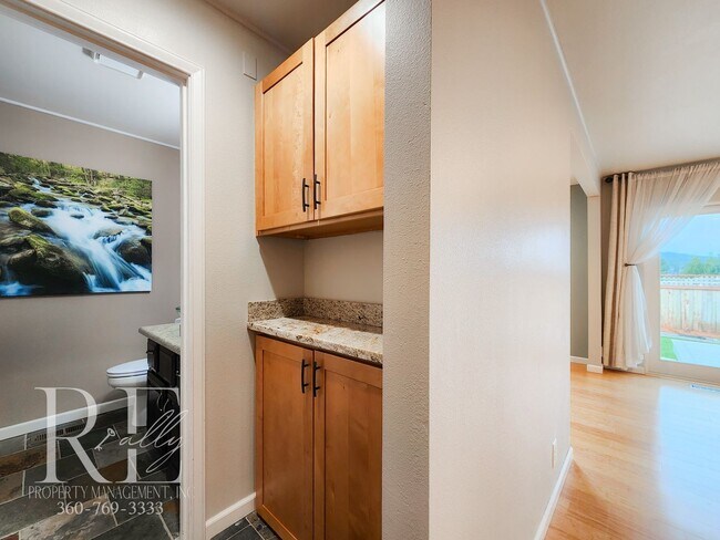 Building Photo - Modern Elegance Meets Tranquil Lakeside Living On Osprey Circle