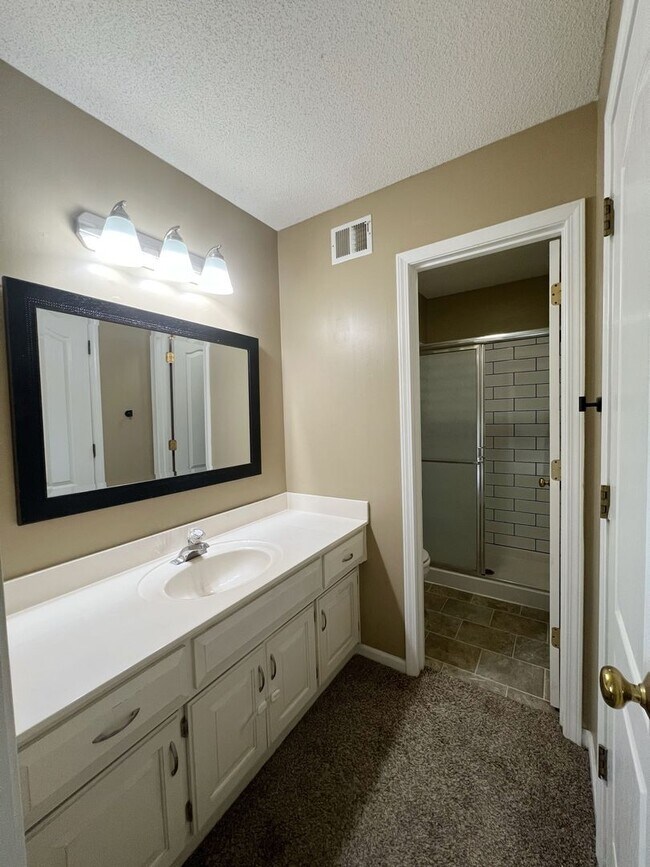 Building Photo - SEE IT NOW: Spacious 4-Bed Home with Finis...