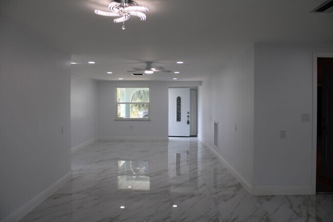 Building Photo - For Rent – 3-Bed / 2.5-Bath Deep Water Canal, Canal-Front Home with a Floating Dock,  totally ren...