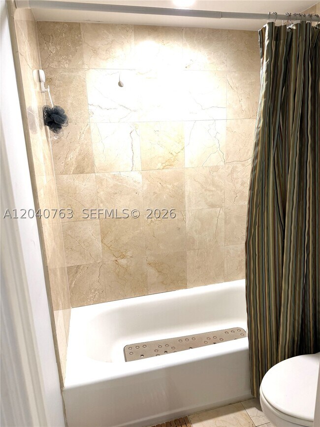 Building Photo - 6917 Collins Ave