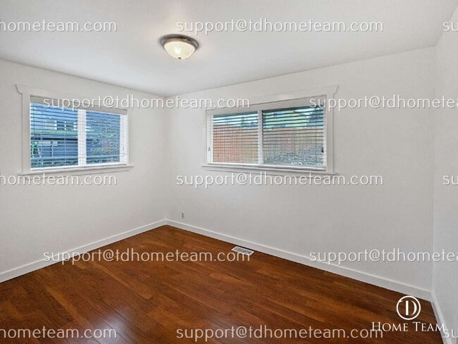 Building Photo - "Charming 4-Bed Family Home in SeaTac with Granite Countertops & Hardwood Floors!"