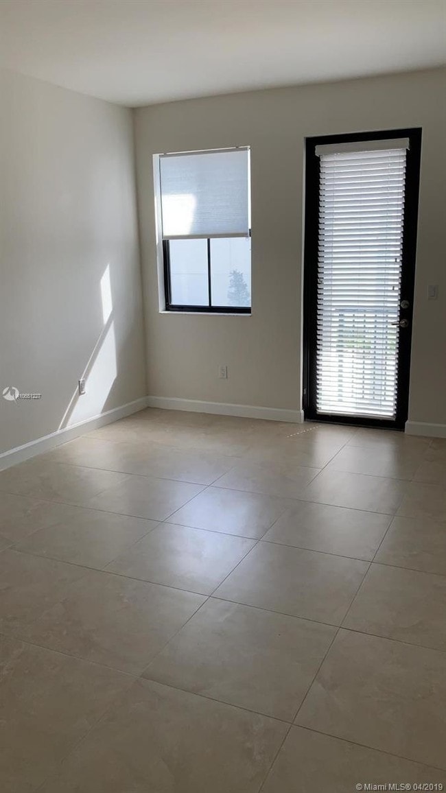 Building Photo - 6175 NW 104th Ct