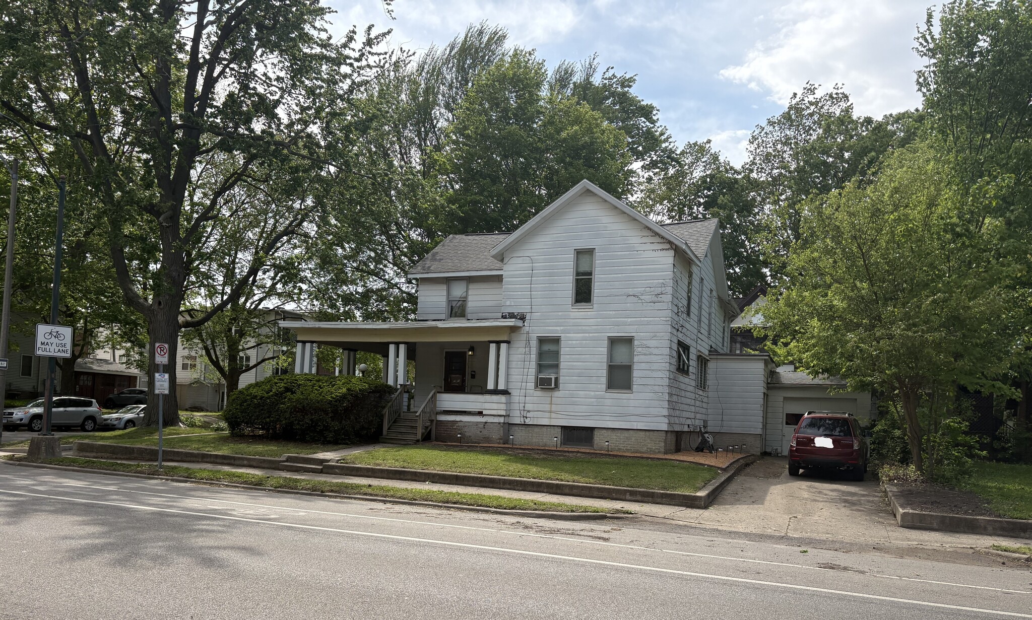 main building side with bus stop - 302 W Washington St
