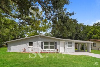 Building Photo - Feel welcome in this well-maintained 4BR 2...
