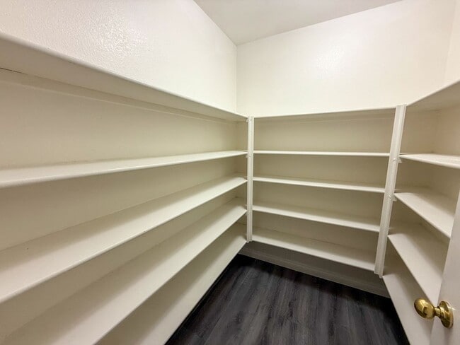 Building Photo - SPACIOUS HOME IN GATED COMMUNITY WITH POOL, RV PARKING & 4-CAR GARAGE!