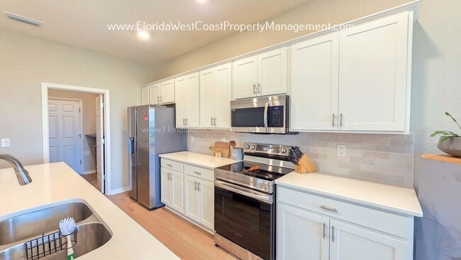 Building Photo - BRILLIANT 4 BEDROOM/2.5 BATH HOME AVAILABLE IN AVIARY at RUTLAND RANCH PARRISH!