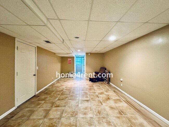 Building Photo - A Lovely, Four Bedroom Lenexa Home w/ Wood...