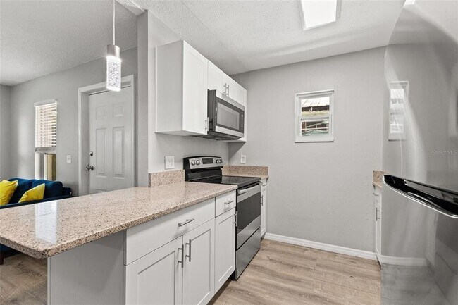 Building Photo - 923 E 12th Ave