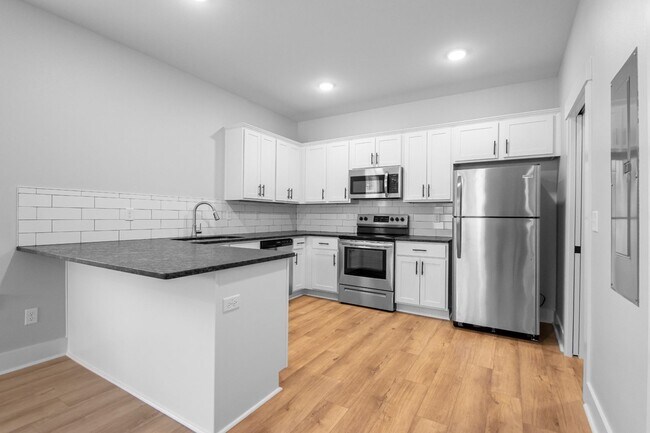 Building Photo - Argenta 1 Bed 1.5 Bath Luxury Energy Effic...